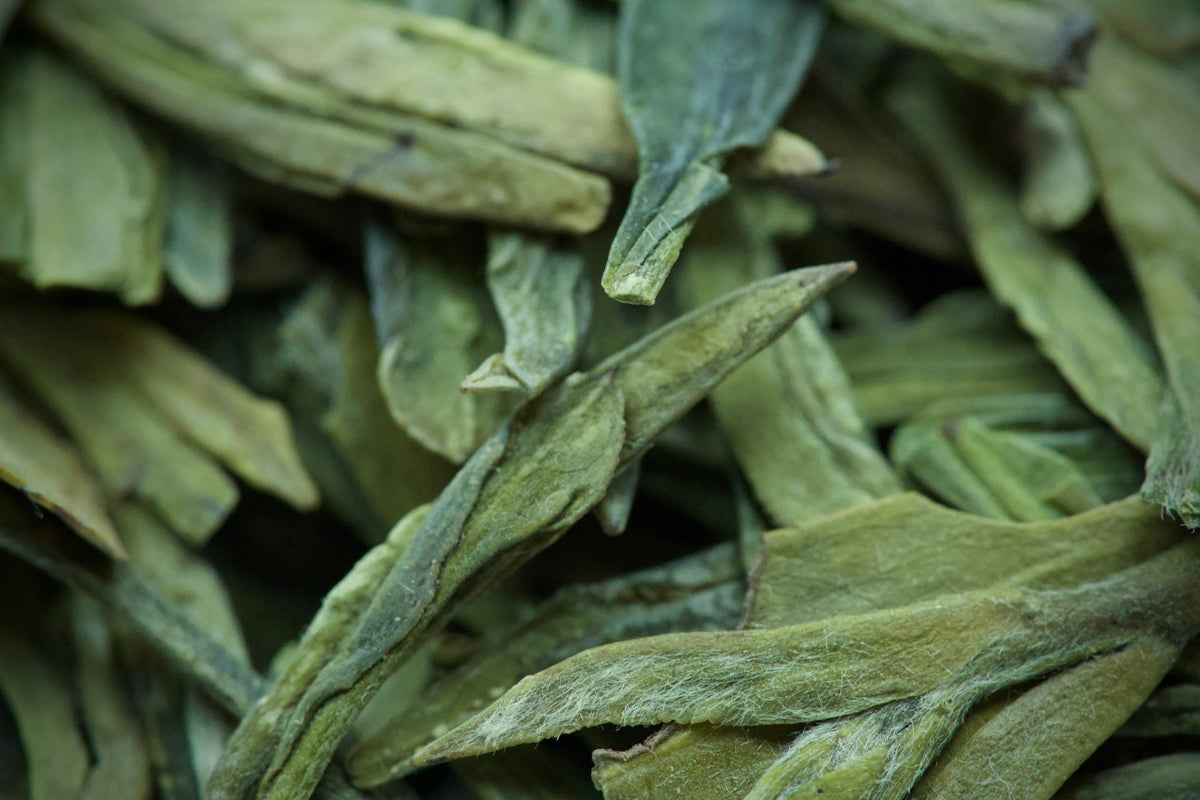Close-up of dried green tea leaves