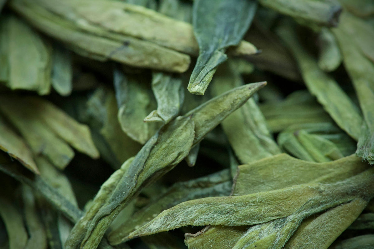 Close-up of dried green tea leaves