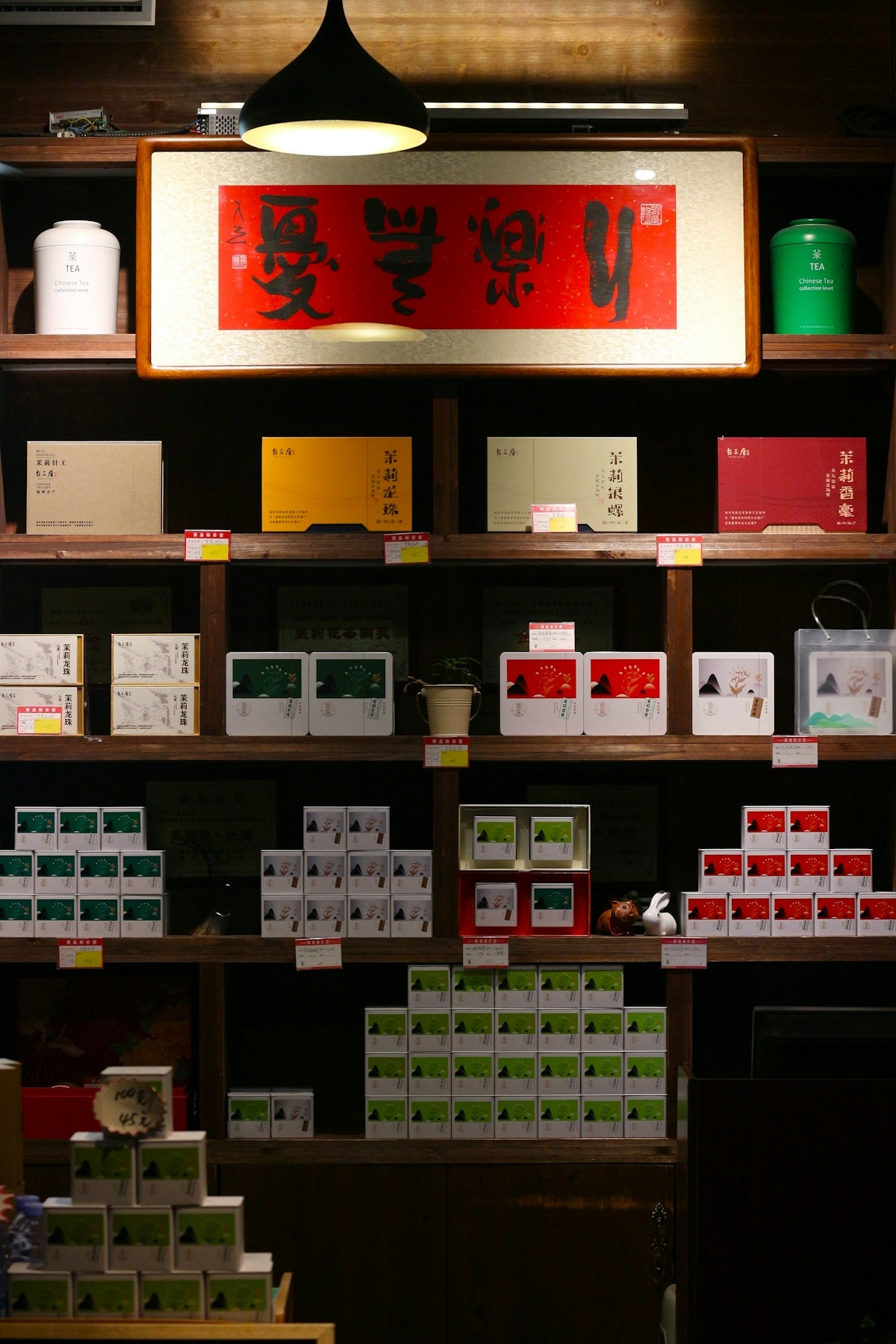 Shelves filled with boxes of tea and other products